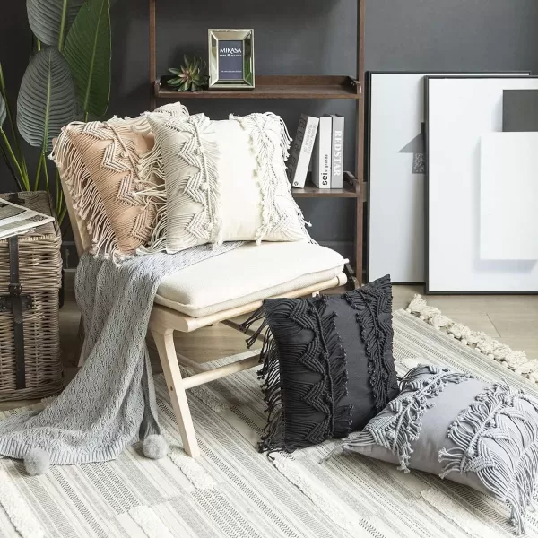 Phantoscope 100 Cotton Handmade Crochet Woven Boho Throw Pillow with Tassel Cute Farmhouse Pillow Insert Included Lumbar Small Decorative Cushion for Couch Sofa Black16 inches RoundOff White