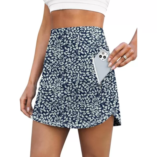 LouKeith Golf Skirts for Women Tennis Skirt with Zipper Pockets High Waisted Running Casual Athletic Skorts Builtin ShortsPattern 1white Leaves