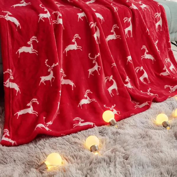 imageFY FIBER HOUSE Christmas Home Decor Flannel Fleece Throw Blanket for Couch Sofa with Reindeer Print50quotX60quot Red