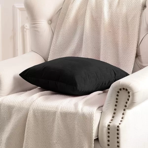 imageFY FIBER HOUSE Pack of 2 Velvet Throw Pillow Covers Christmas Decorative Square Pillowcase Soft Solid Cushion Case for SoFaCouch Use 20 x 20 Inch RedBlack