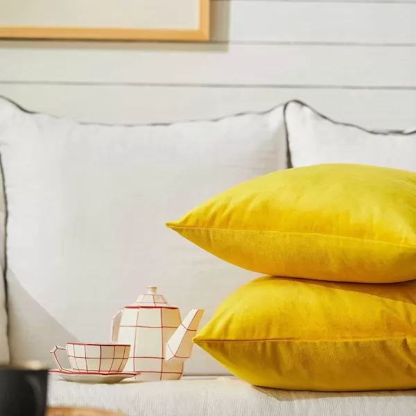 imageFY FIBER HOUSE Pack of 2 Velvet Throw Pillow Covers Christmas Decorative Square Pillowcase Soft Solid Cushion Case for SoFaCouch Use 20 x 20 Inch RedYellow