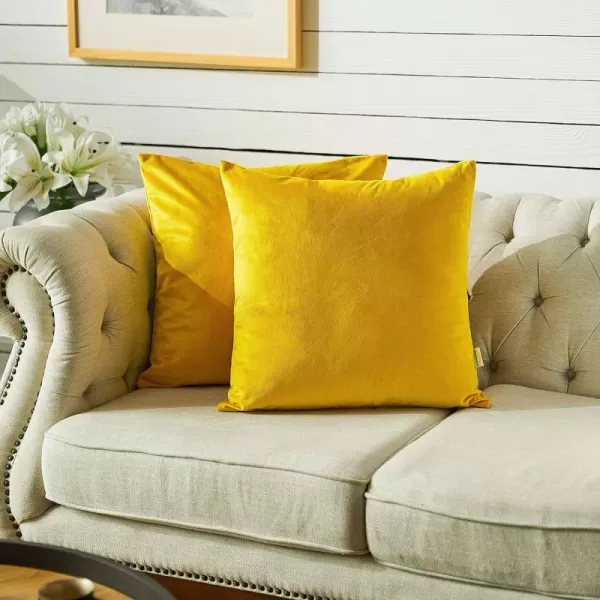 imageFY FIBER HOUSE Pack of 2 Velvet Throw Pillow Covers Christmas Decorative Square Pillowcase Soft Solid Cushion Case for SoFaCouch Use 20 x 20 Inch RedYellow