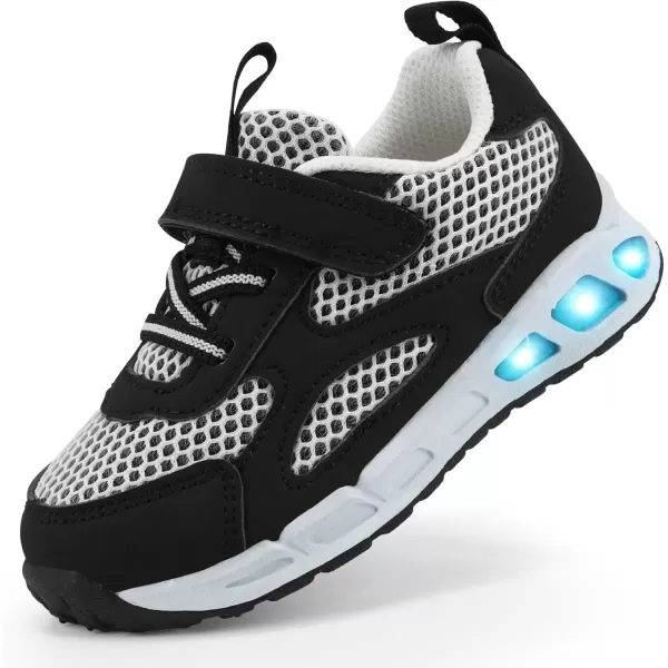 imageLight Up Toddler Boys Girls Shoes LED Flashing Lightweight Tennis Walking Sneakers for Toddler and Little KidBlackWhite Kids Light Up Shoes