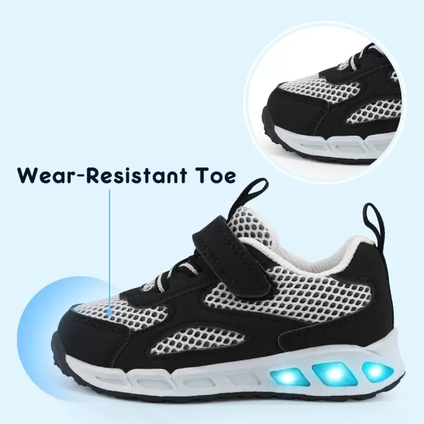 imageLight Up Toddler Boys Girls Shoes LED Flashing Lightweight Tennis Walking Sneakers for Toddler and Little KidBlackWhite Kids Light Up Shoes