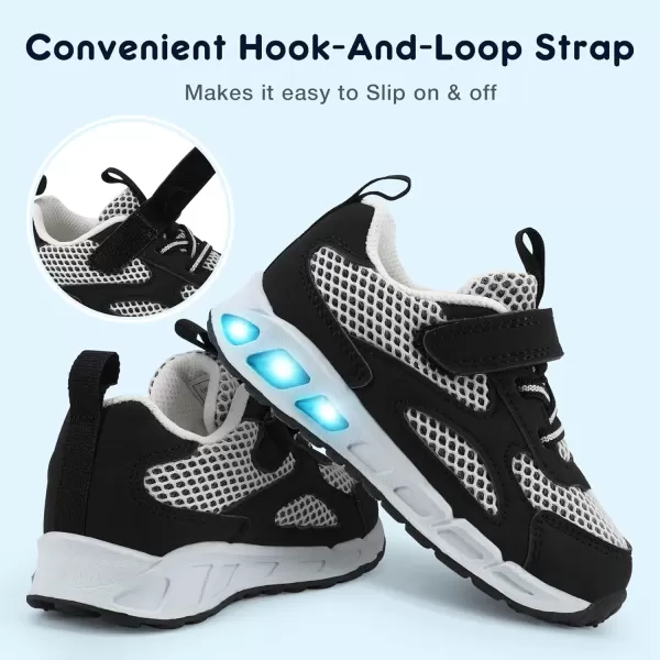 imageLight Up Toddler Boys Girls Shoes LED Flashing Lightweight Tennis Walking Sneakers for Toddler and Little KidBlackWhite Kids Light Up Shoes