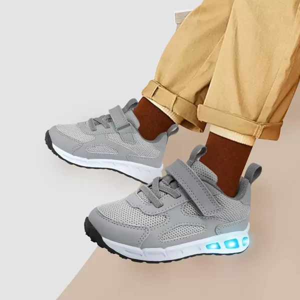 imageLight Up Toddler Boys Girls Shoes LED Flashing Lightweight Tennis Walking Sneakers for Toddler and Little KidToddler Boy Shoes Grey Light Up