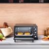 imageCOMFEE Mini 2Slice Toaster Oven Countertop toaster oven 2Knobs Easy to Control with Timer for Bake Broil Toast 1000W BlackWhite COB08AABK25 L