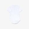 imageLacoste Unisex Baby Organic Cotton Piqu Bodysuit in Recycled Cardboard Box SetWhite