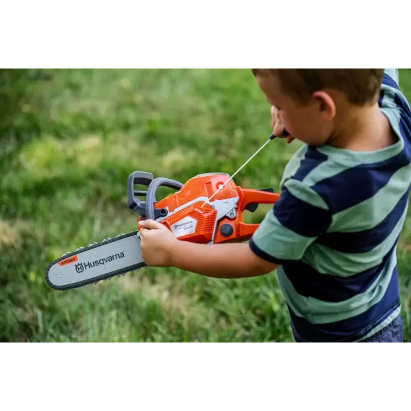 imageHusqvarna Toy Chainsaw with Realistic Sounds and Rotating Chain Chainsaw Toy for Kids Ages 3 and Up550 XP