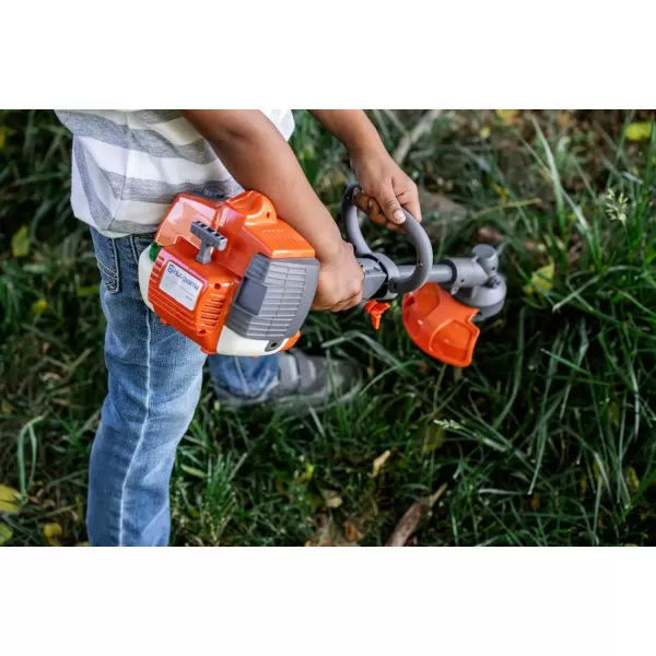 imageHusqvarna Toy Trimmer with Realistic Sounds and LightUp Trimmer Line Toy Weed Eater for Kids Ages 3 and UpToy TrimmerNew