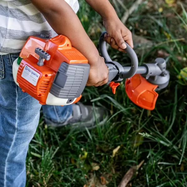 imageHusqvarna Toy Trimmer with Realistic Sounds and LightUp Trimmer Line Toy Weed Eater for Kids Ages 3 and UpToy TrimmerOld