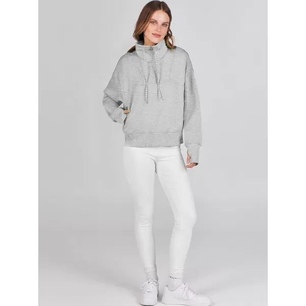 Caracilia Womens Half Zip Loose Sweatshirt Quarter Zip Trendy Long Sleeve Cropped Pullover Tops with Thumb Hole