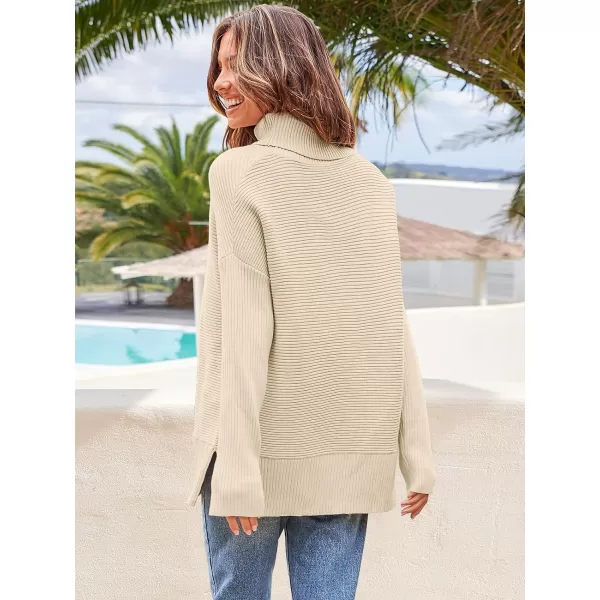 Caracilia Women's Turtleneck Oversized 2023 Fall Long Batwing Sleeve Pullover Knit Tunic Sweater Top with Spilt Hem