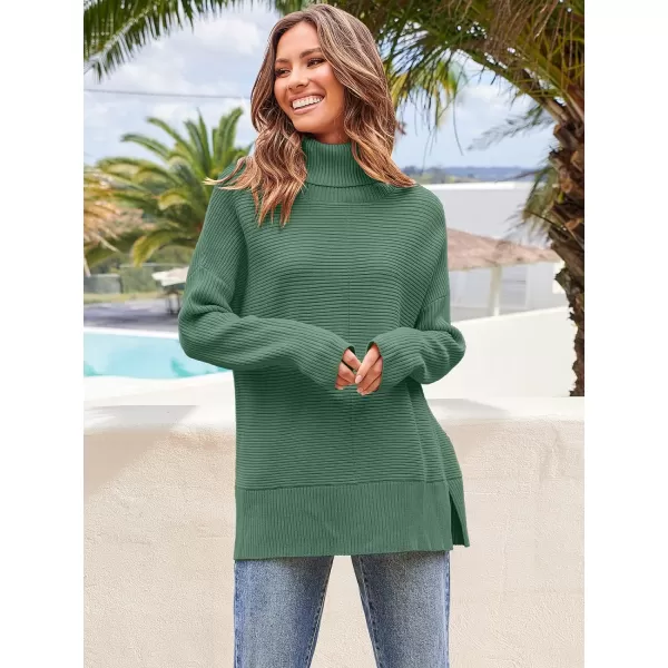 Caracilia Women's Turtleneck Oversized 2023 Fall Long Batwing Sleeve Pullover Knit Tunic Sweater Top with Spilt Hem