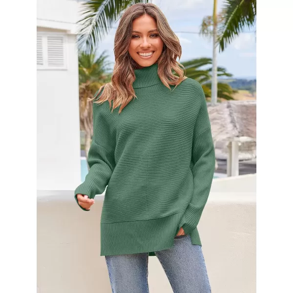 Caracilia Women's Turtleneck Oversized 2023 Fall Long Batwing Sleeve Pullover Knit Tunic Sweater Top with Spilt Hem