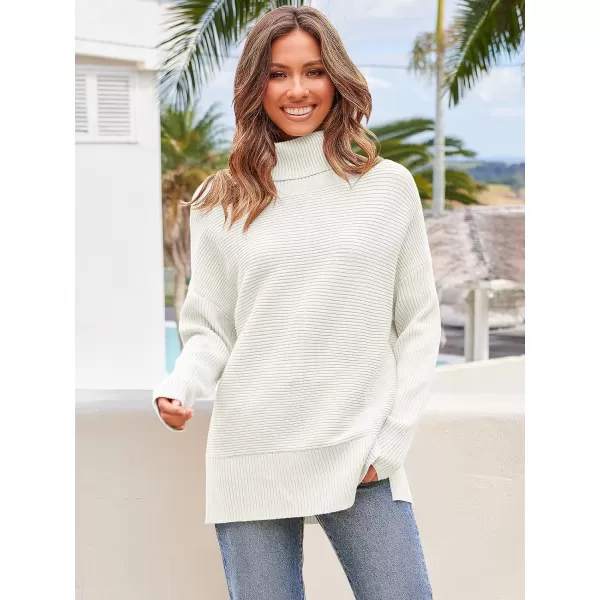 Caracilia Women's Turtleneck Oversized 2023 Fall Long Batwing Sleeve Pullover Knit Tunic Sweater Top with Spilt Hem