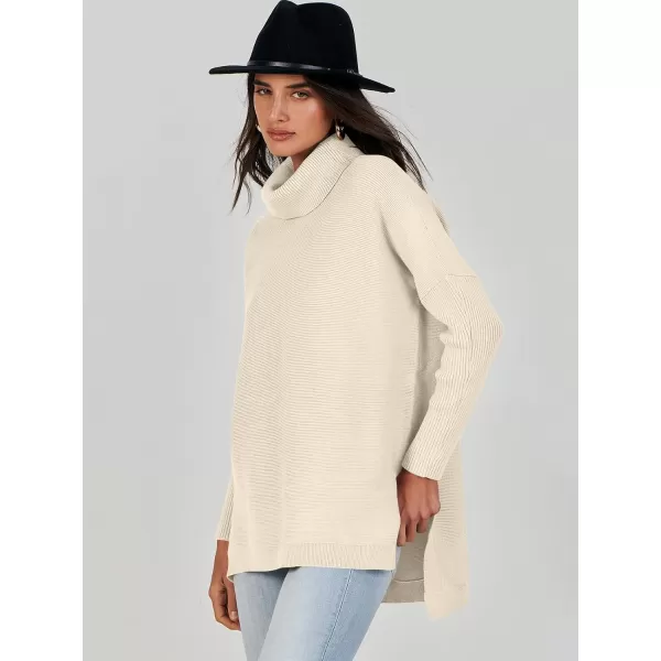 Caracilia Women's Turtleneck Oversized Knit Sweater 2023 Fall Long Batwing Sleeve Spilt Hem Pullover Sweater High Low Tops