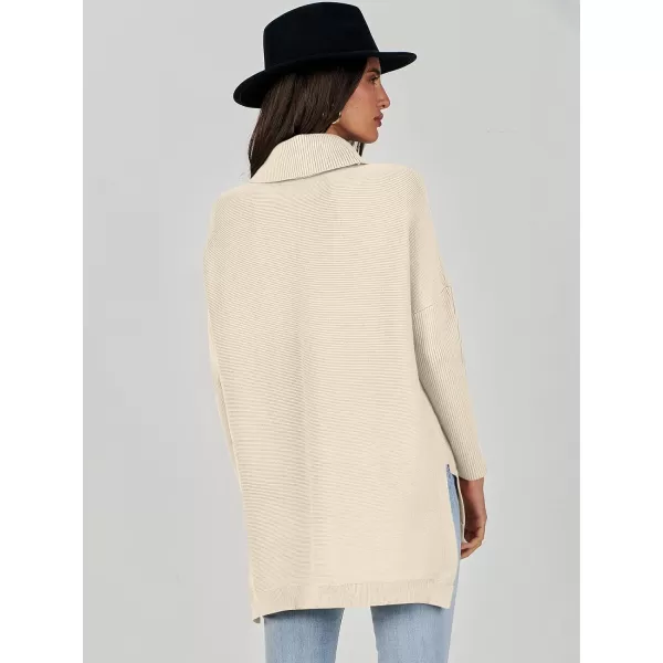 Caracilia Women's Turtleneck Oversized Knit Sweater 2023 Fall Long Batwing Sleeve Spilt Hem Pullover Sweater High Low Tops