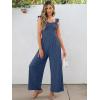 imageCaracilia Womens Jumpsuit Sleeveless Casual Dressy Smocked Wide Leg Rompers Summer Vacation Jumpers with Pockets 2025 OutfitsBlue