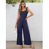 imageCaracilia Womens Jumpsuit Sleeveless Casual Dressy Smocked Wide Leg Rompers Summer Vacation Jumpers with Pockets 2025 OutfitsDeep Blue