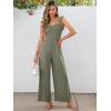 imageCaracilia Womens Jumpsuit Sleeveless Casual Dressy Smocked Wide Leg Rompers Summer Vacation Jumpers with Pockets 2025 OutfitsOlive