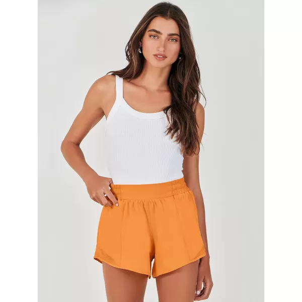 imageANRABESS Running Shorts for Women Quick Dry Athletic Sports Shorts Lightweight Active Workout Gym Shorts with Zip PocketOrange