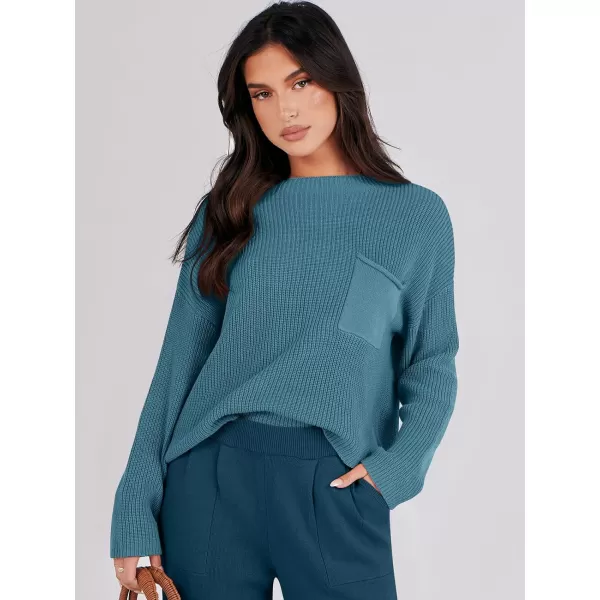imageANRABESS Women Casual Long Sleeve Knit Loose Fit Mock Neck Fall Trendy Cropped Sweater Top with PocketsBlue