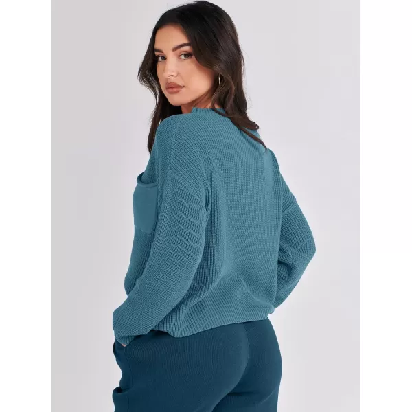 imageANRABESS Women Casual Long Sleeve Knit Loose Fit Mock Neck Fall Trendy Cropped Sweater Top with PocketsBlue