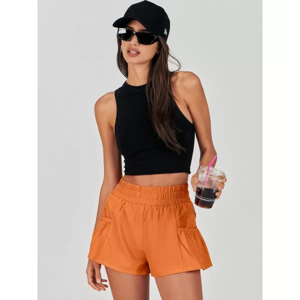 imageANRABESS Women High Waisted Quick Dry Flowy Shorts Gym Workout Running Athletic Short with PocketsOrange