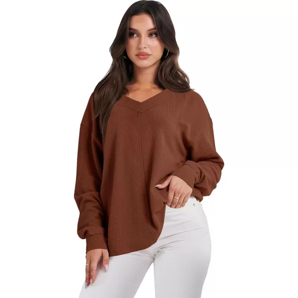 imageANRABESS Women Long Sleeve Shirt V Neck Off Shoulder Oversized Knit Pullover Sweatshirt Loose High Low Fall Tunic TopsCaramel