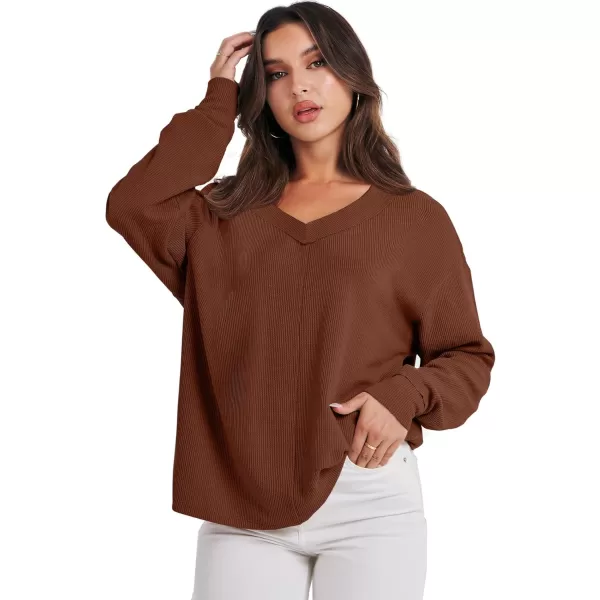 imageANRABESS Women Long Sleeve Shirt V Neck Off Shoulder Oversized Knit Pullover Sweatshirt Loose High Low Fall Tunic TopsCaramel