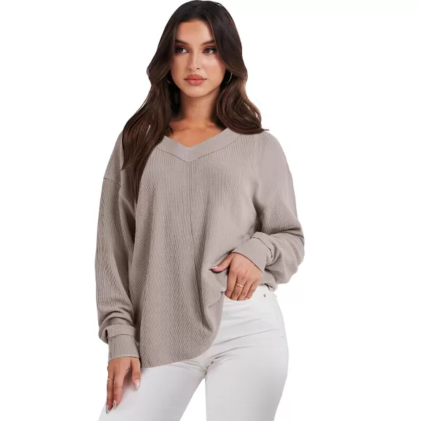 imageANRABESS Women Long Sleeve V Neck Off Shoulder Oversized Knit Pullover Sweatshirt Loose Fit High Low Tunic TopsApricot