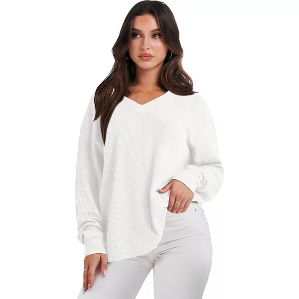 imageANRABESS Women Long Sleeve V Neck Off Shoulder Oversized Knit Pullover Sweatshirt Loose Fit High Low Tunic TopsWhite