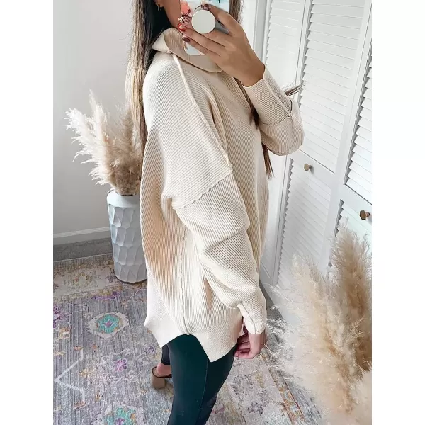 imageANRABESS Women Turtleneck Batwing Sleeve Oversized Side Slit Ribbed Knit Pullover Sweater TopApricot