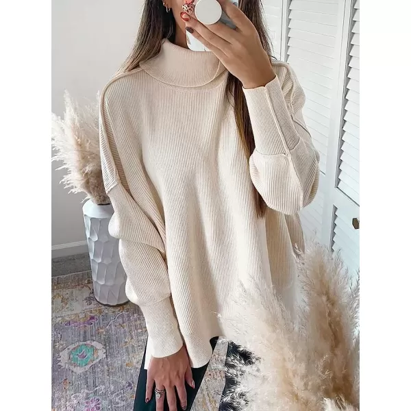 imageANRABESS Women Turtleneck Batwing Sleeve Oversized Side Slit Ribbed Knit Pullover Sweater TopApricot