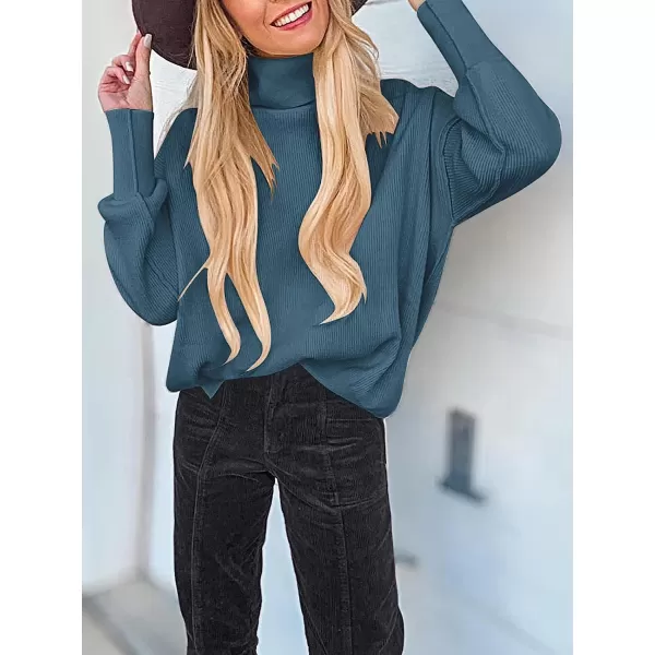 imageANRABESS Women Turtleneck Batwing Sleeve Oversized Side Slit Ribbed Knit Pullover Sweater TopBlue