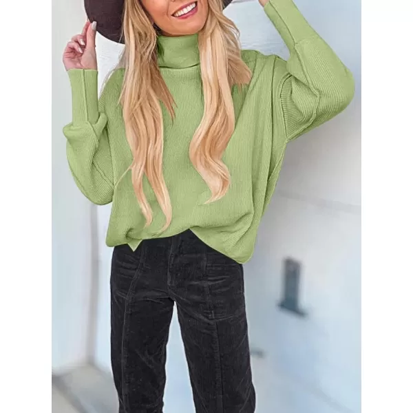 imageANRABESS Women Turtleneck Batwing Sleeve Oversized Side Slit Ribbed Knit Pullover Sweater TopPea