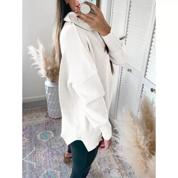 imageANRABESS Women Turtleneck Batwing Sleeve Oversized Side Slit Ribbed Knit Pullover Sweater TopWhite