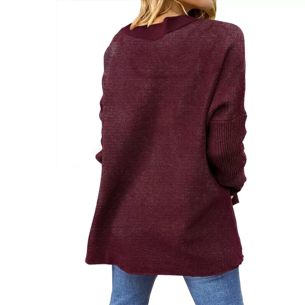 imageANRABESS Womens 2023 Casual Oversized Long Batwing Sleeve Crewneck Spilt High Low Hem Knit Tunic Pullover Sweater TopsWine Red