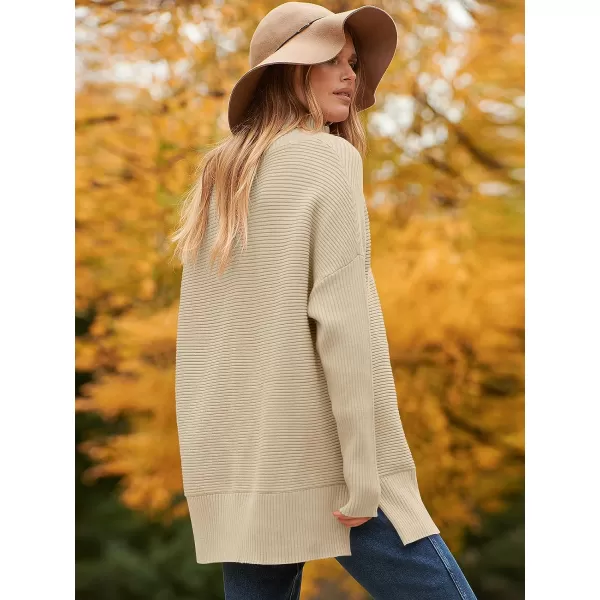 imageANRABESS Womens 2023 Fall Sweaters Oversized Turtleneck Long Batwing Sleeve Split Hem Pullover Knit Sweater TopsApricot