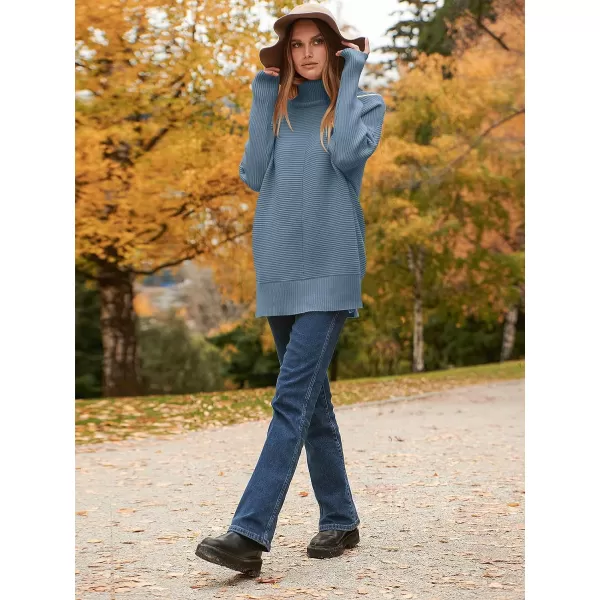 imageANRABESS Womens 2023 Fall Sweaters Oversized Turtleneck Long Batwing Sleeve Split Hem Pullover Knit Sweater TopsIndigo