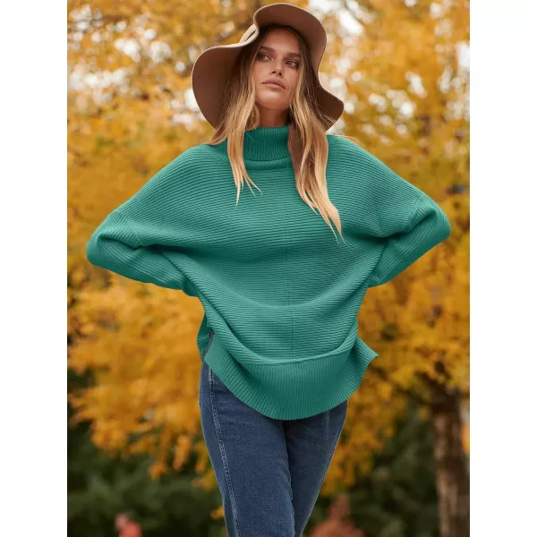 imageANRABESS Womens 2023 Fall Sweaters Oversized Turtleneck Long Batwing Sleeve Split Hem Pullover Knit Sweater TopsOpal