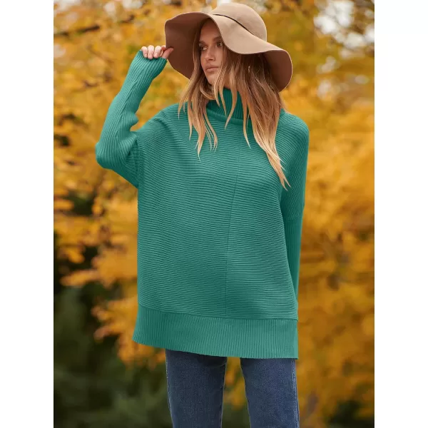 imageANRABESS Womens 2023 Fall Sweaters Oversized Turtleneck Long Batwing Sleeve Split Hem Pullover Knit Sweater TopsOpal