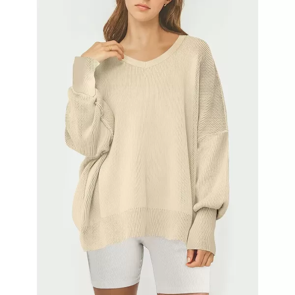 imageANRABESS Womens Casual Oversized Sweater V Neck Batwing Sleeve Side Slit Ribbed Knit Pullover Top 2023 Winter ClothesApricot