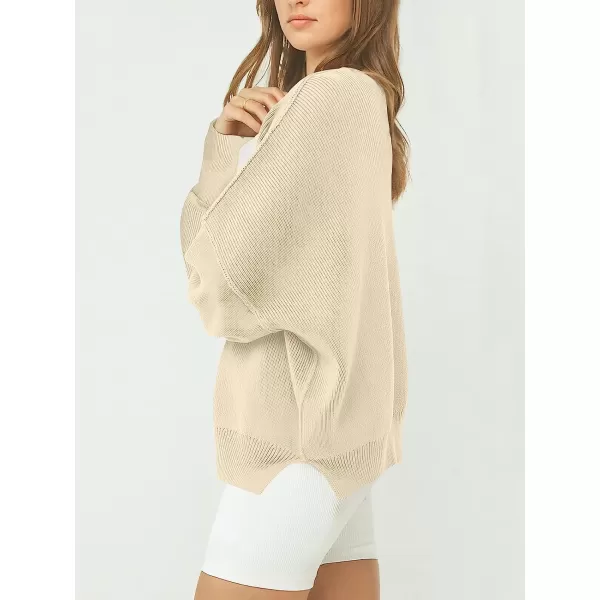 imageANRABESS Womens Casual Oversized Sweater V Neck Batwing Sleeve Side Slit Ribbed Knit Pullover Top 2023 Winter ClothesApricot