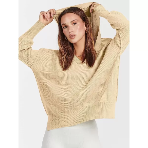 imageANRABESS Womens Long Sleeve V Neck Hooded Drop Shoulder Oversized Slouchy Knit Pullover Sweater with SlitApricot