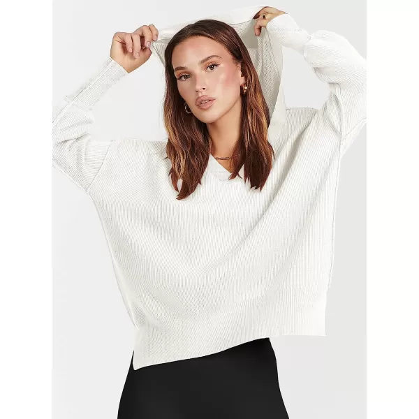 imageANRABESS Womens Long Sleeve V Neck Hooded Drop Shoulder Oversized Slouchy Knit Pullover Sweater with SlitWhite