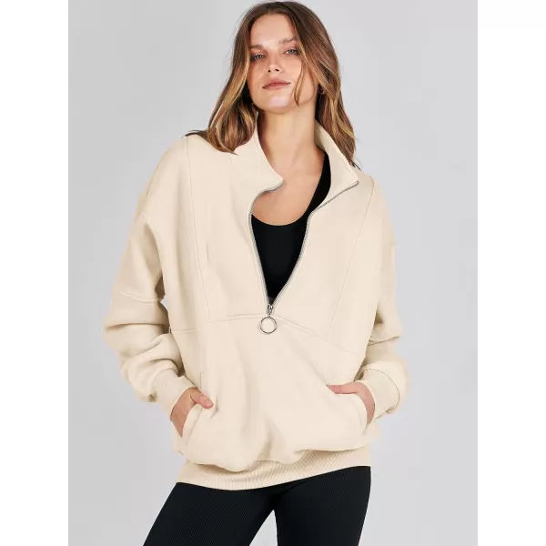 imageANRABESS Womens Oversized Quarter Zip Sweatshirt Long Sleeve Drop Shoulder Pullover Fleece Half Zip Hoodie Fall ClothesApricot