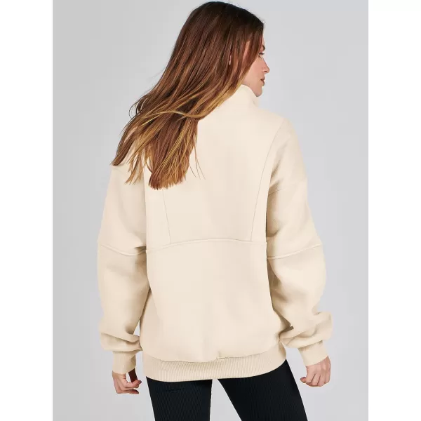 imageANRABESS Womens Oversized Quarter Zip Sweatshirt Long Sleeve Drop Shoulder Pullover Fleece Half Zip Hoodie Fall ClothesApricot