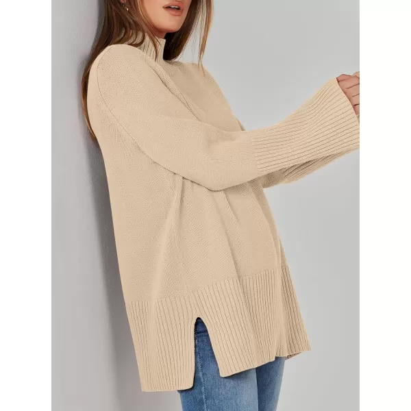 imageANRABESS Womens Trendy Sweaters Pullover Turtleneck Oversized Long Sleeve Split Hem Casual Knit Sweater TopsApricot